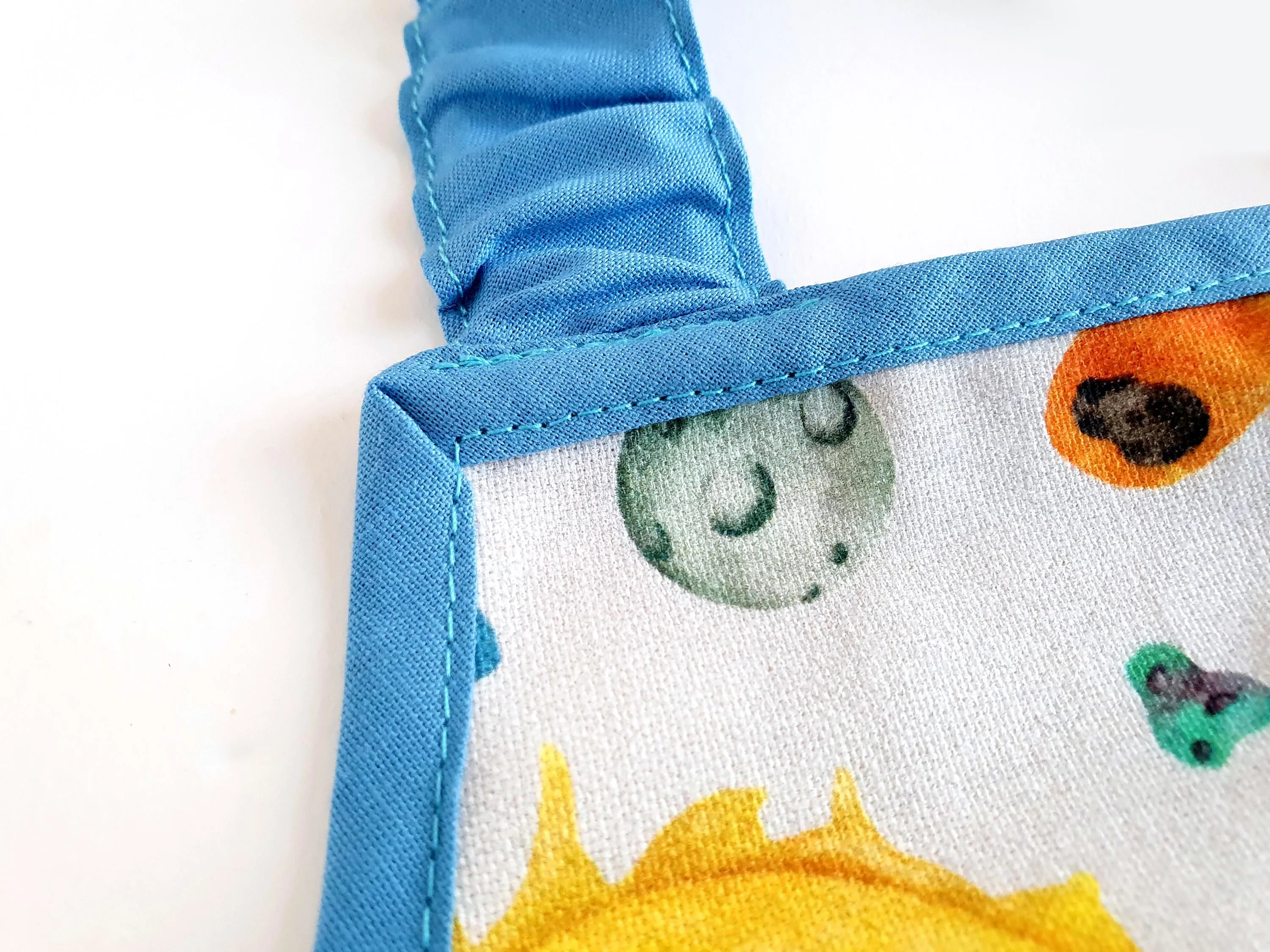 Montessori Apron Planets in Organic Oeko-Tex Cotton (water and stain resistant)